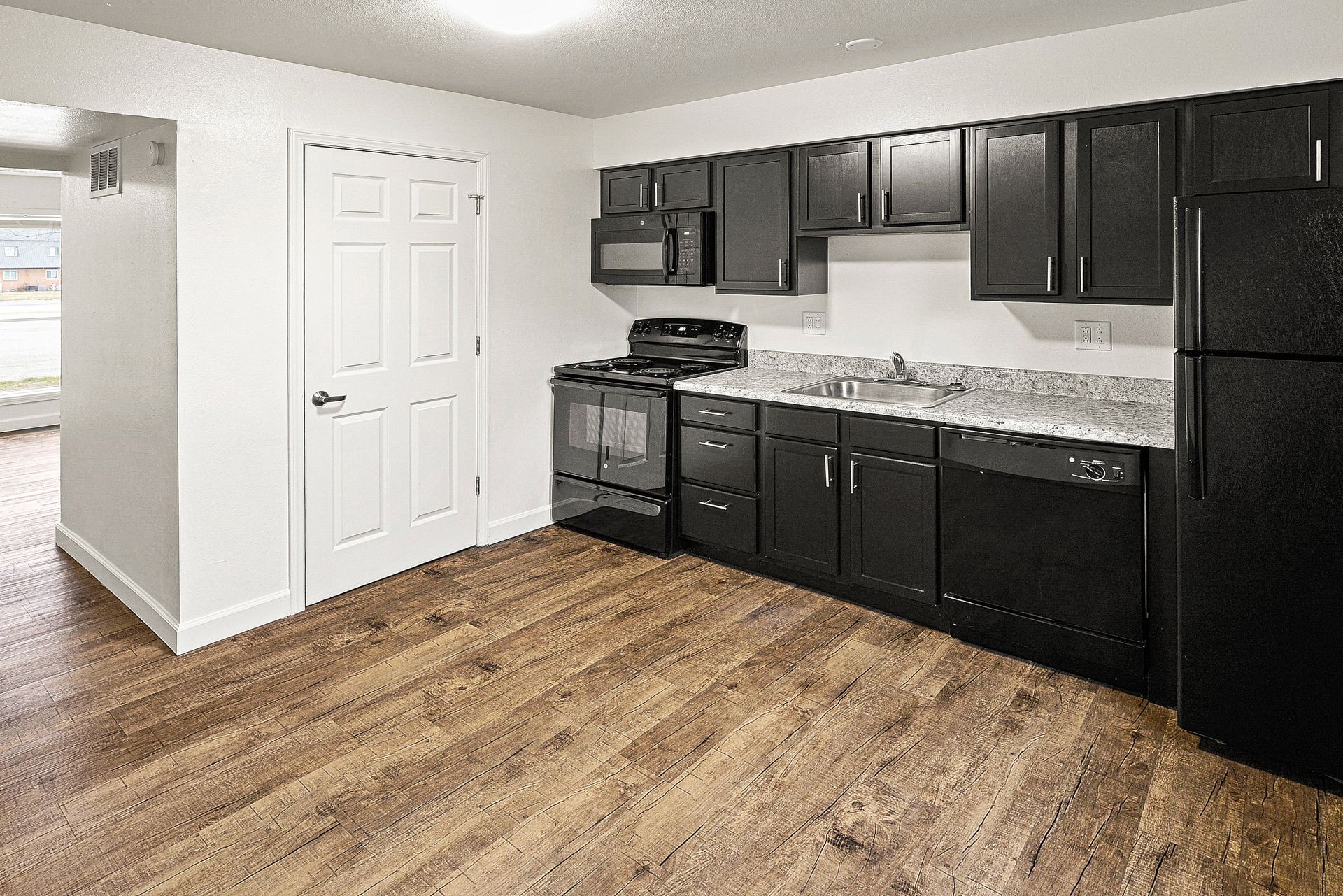 Updated kitchen with espresso cabinets