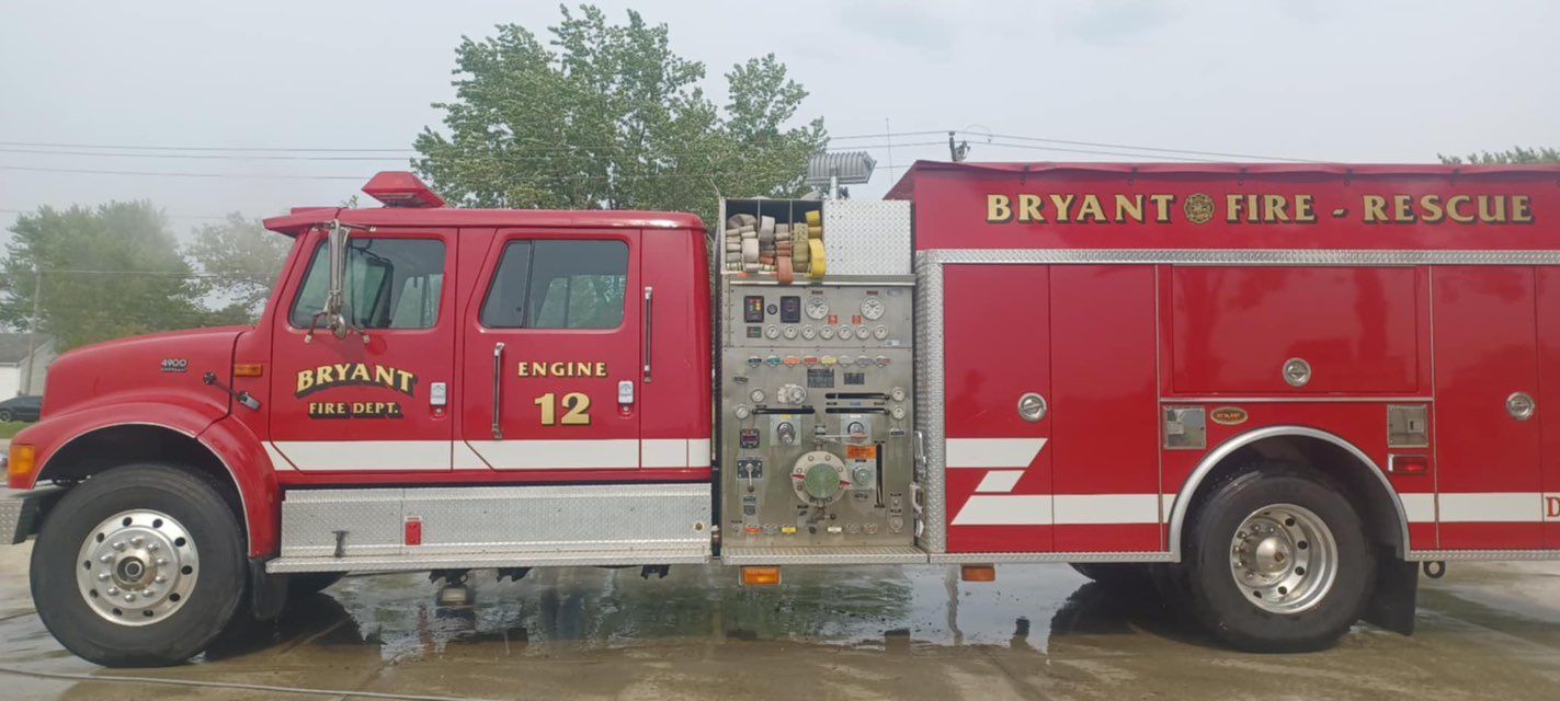 A red fire truck with the number 12 on the side