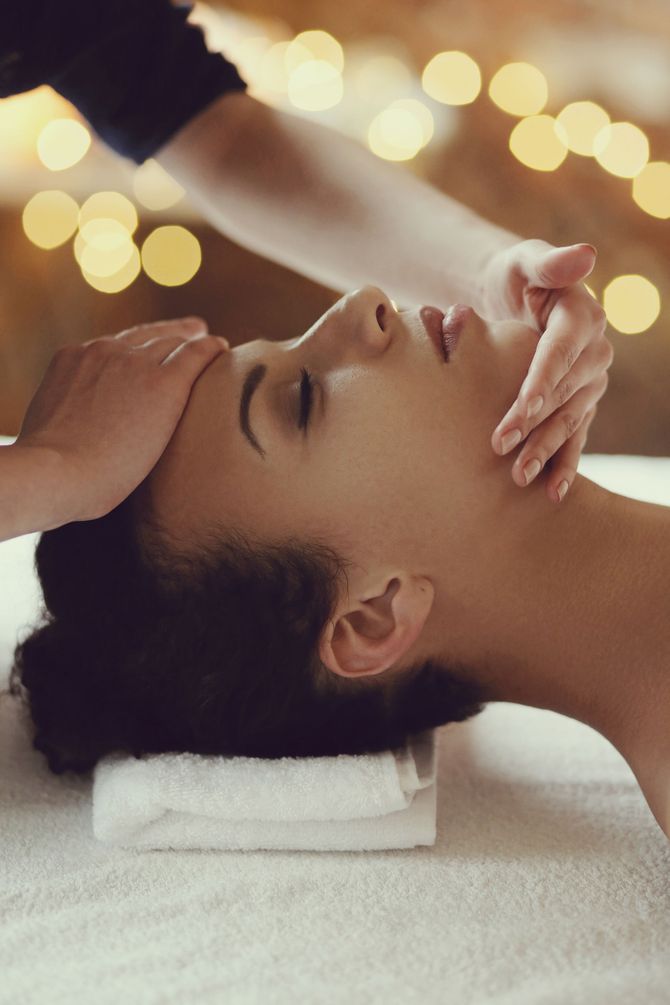 A woman is getting a massage in a spa.