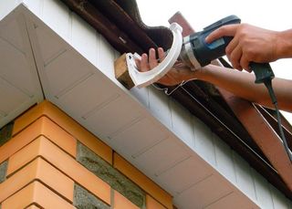 Gutter Installation with Automatic Pop-up Drains - WeatherTek, LLC -  Jacksonville, FL Seamless Gutters
