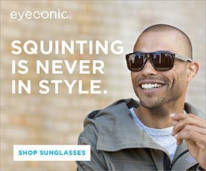 Man smiling, wearing sunglasses. 