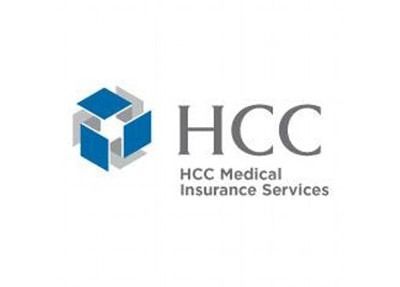 Logo for HCC Medical Insurance Services, featuring a blue and white cube icon next to text.