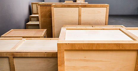 Stacked wooden crates in a storage area