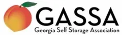 The logo for the georgia self storage association has a peach on it.