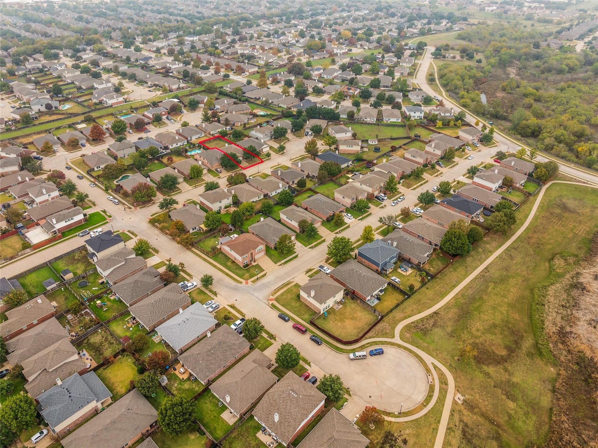 an aerial view of a residential area with lots of houses