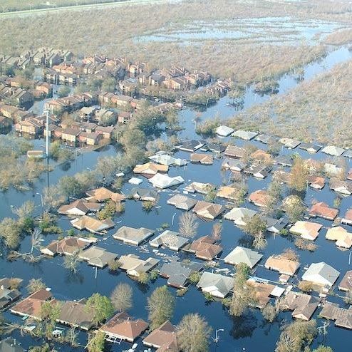 An aerial view of a flooded residential area