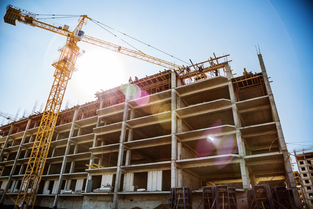 construction on a multifloor building using renting vs buying construction equipment