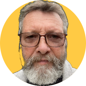 A man with glasses and a beard is in a yellow circle