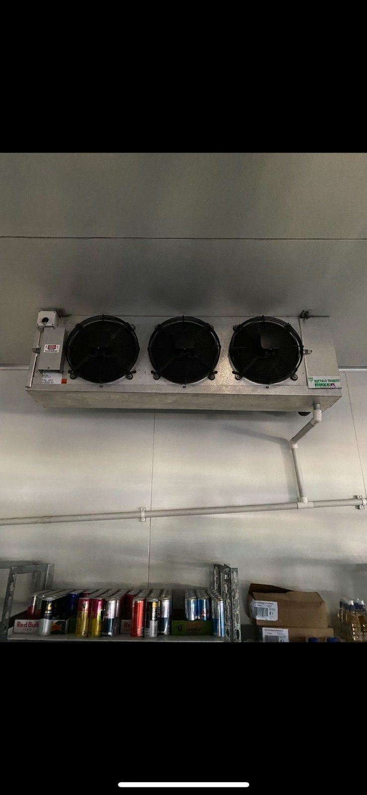 A Refrigerator Cooling Unit with Three Fans Mounted — Refrigeration & Air Conditioning in Jewells, NSW