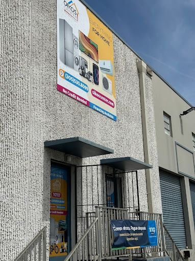 A building with a large sign on the side of it.