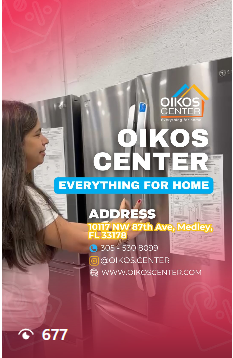 A woman is standing in front of a refrigerator in a store.