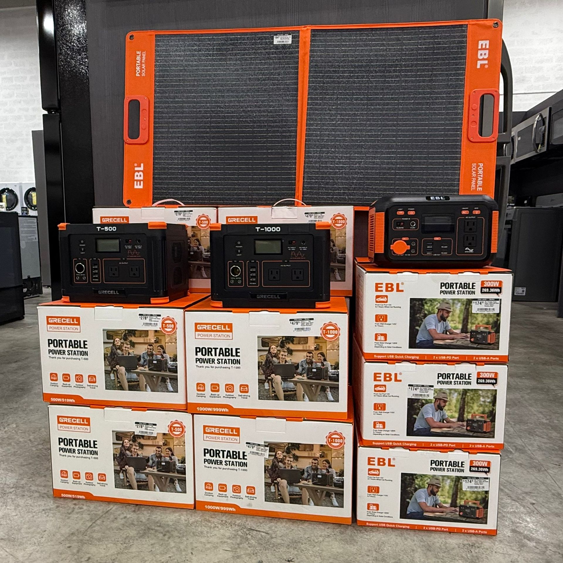 Two stainless steel grills are sitting next to each other in a kitchen.
