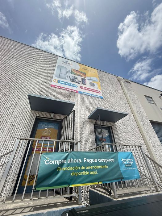 A building with a large sign on the side of it.