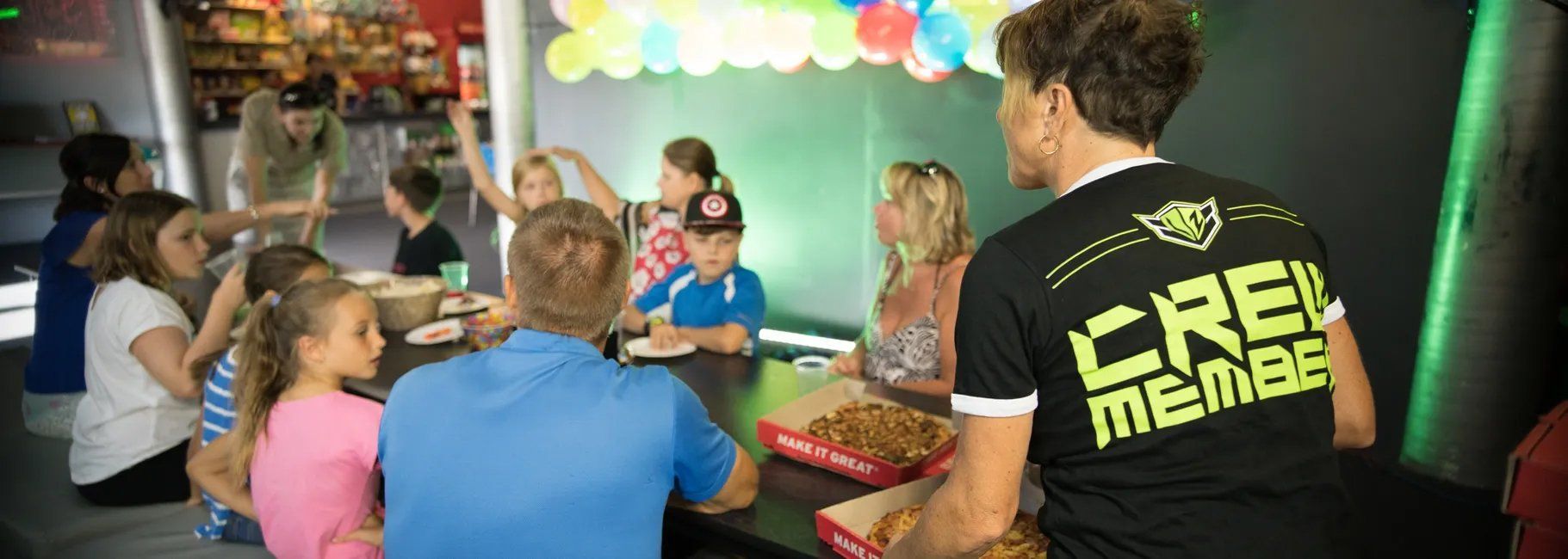 A Laserzone crew member hosts a catered kids birthday party.