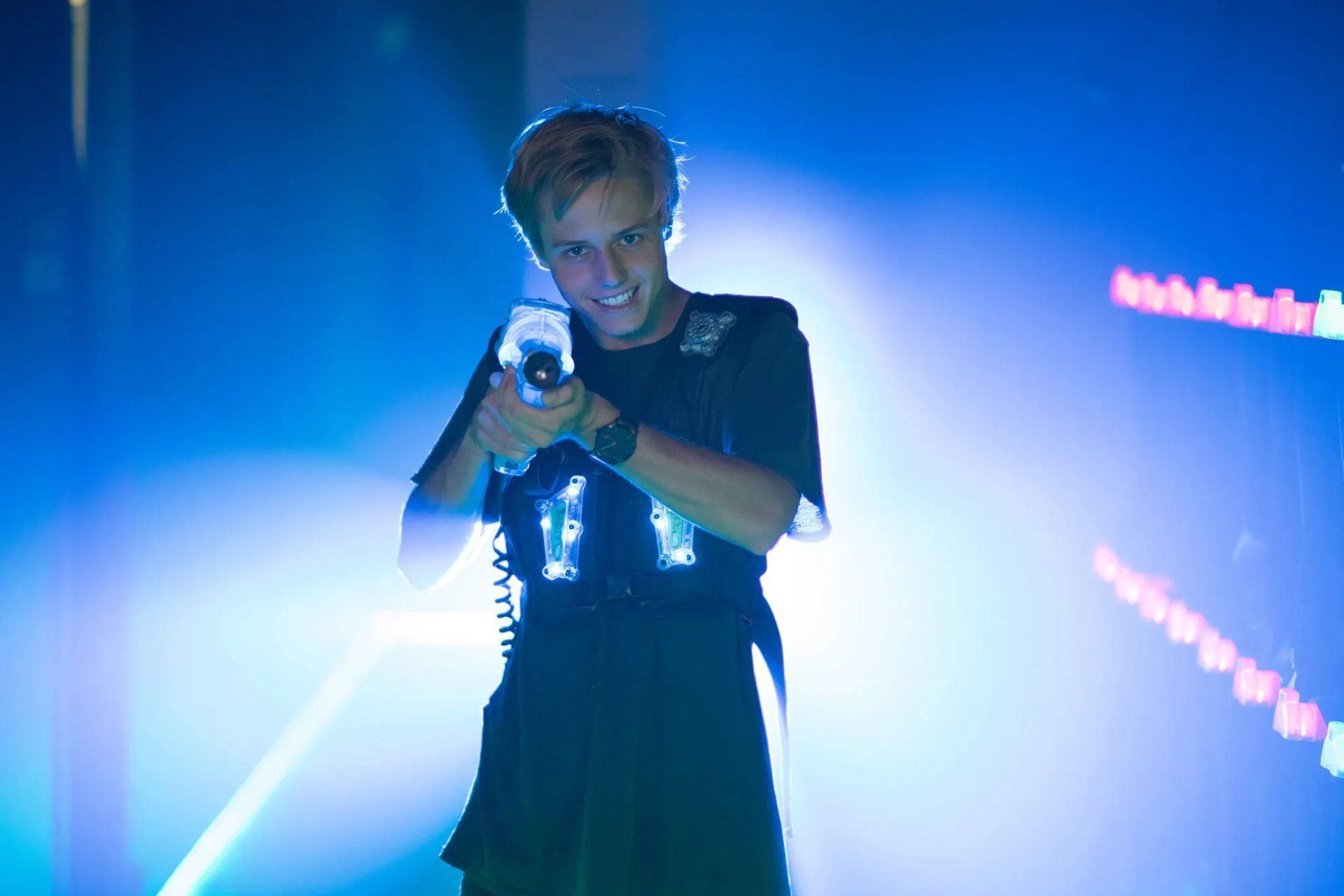 Young adult plays laser tag