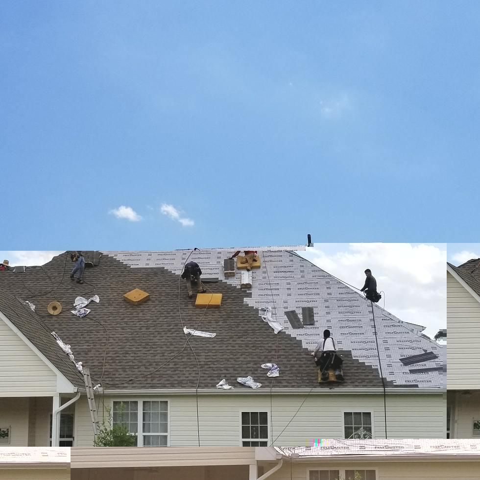 A house with a roof that is being repaired
