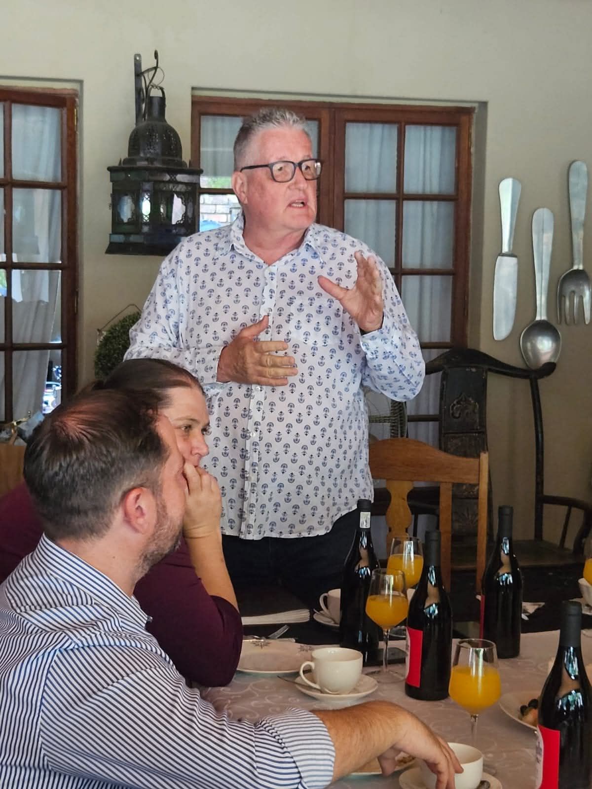 Founder of Pivot2Connect leading a business meeting.