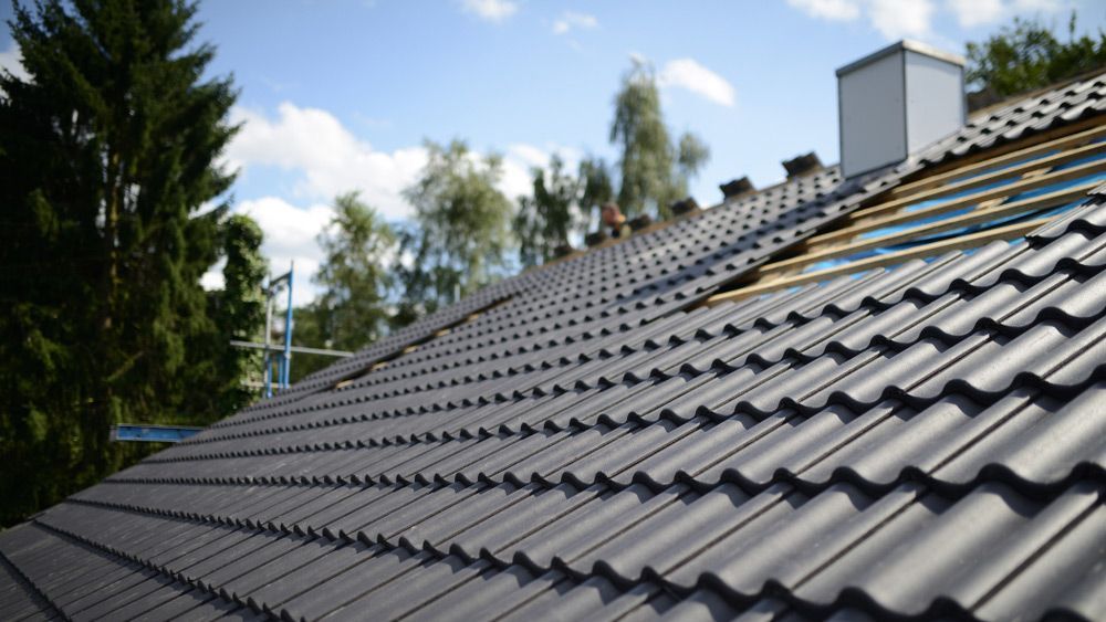 Black Roof Tiles — Roofing In Byron Bay, NSW
