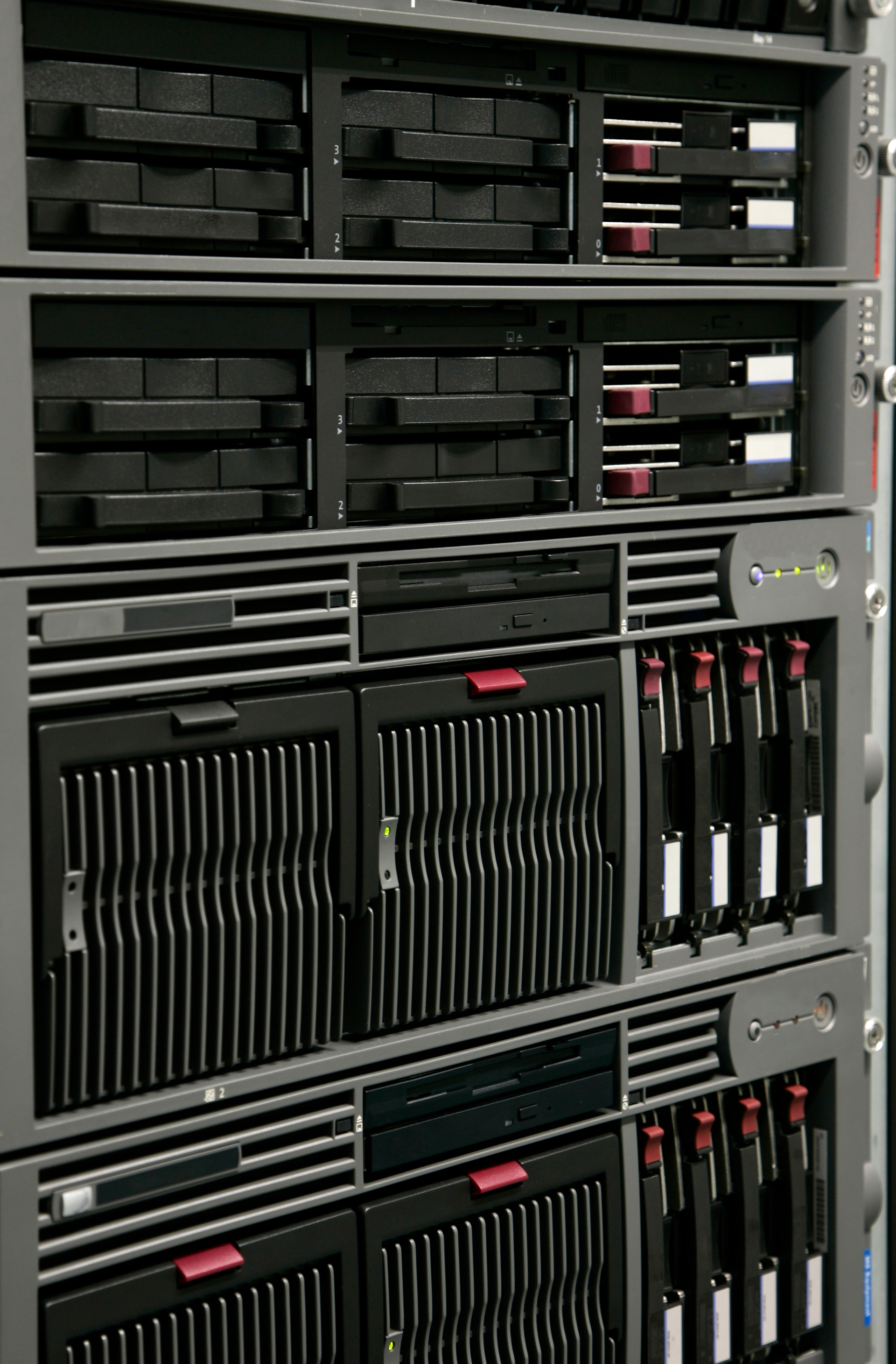 A row of servers are stacked on top of each other