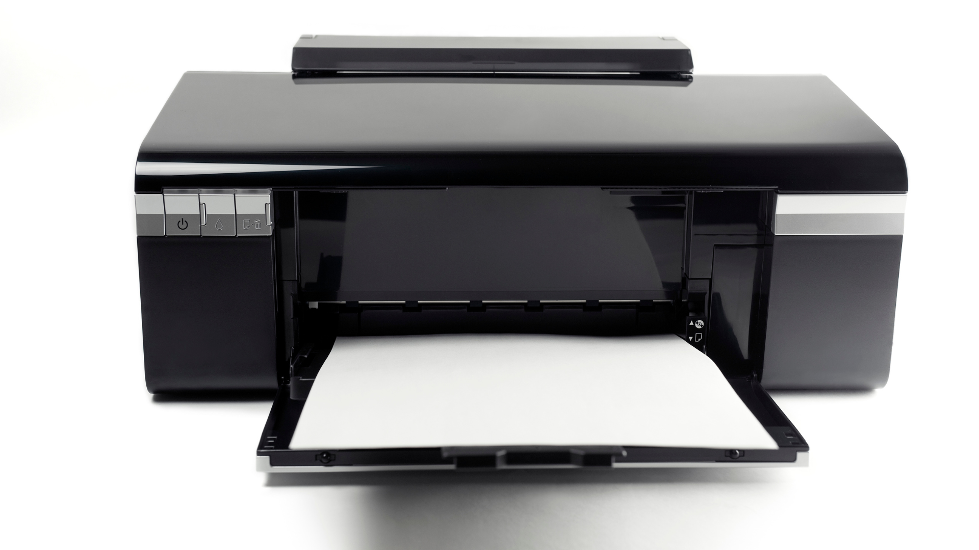 A black printer with a sheet of paper coming out of it