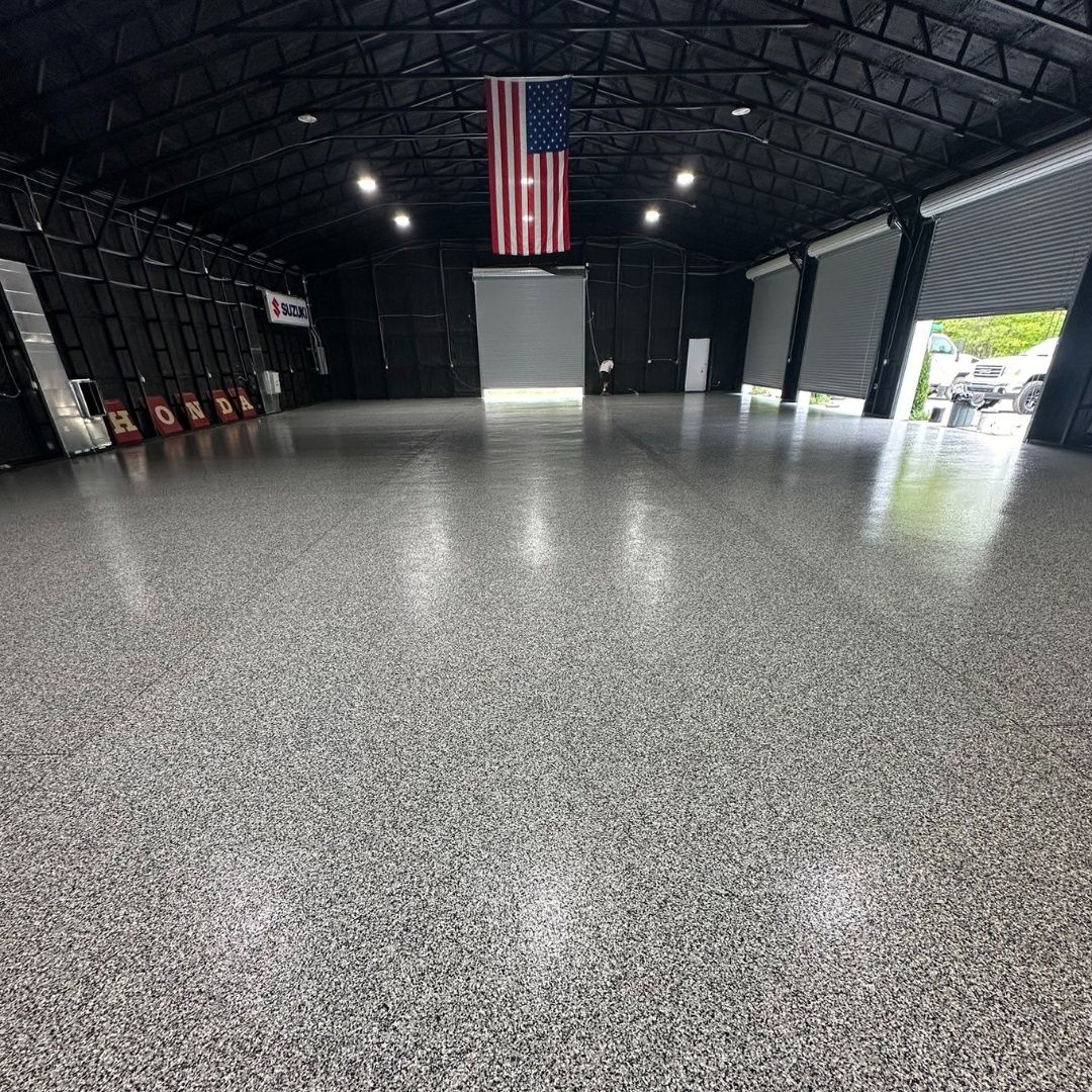 A large warehouse with a flag hanging from the ceiling.