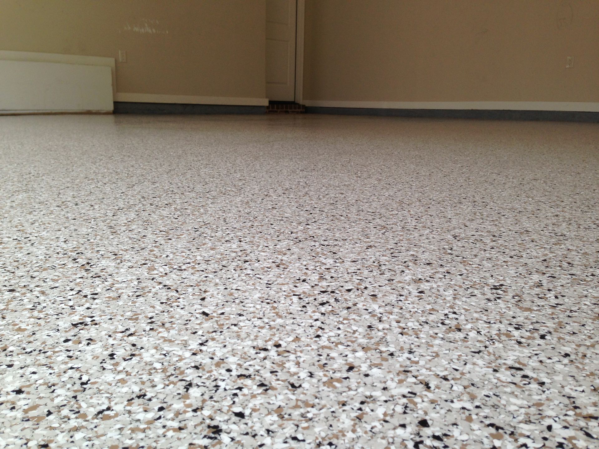 A close up of a white and black floor in a room