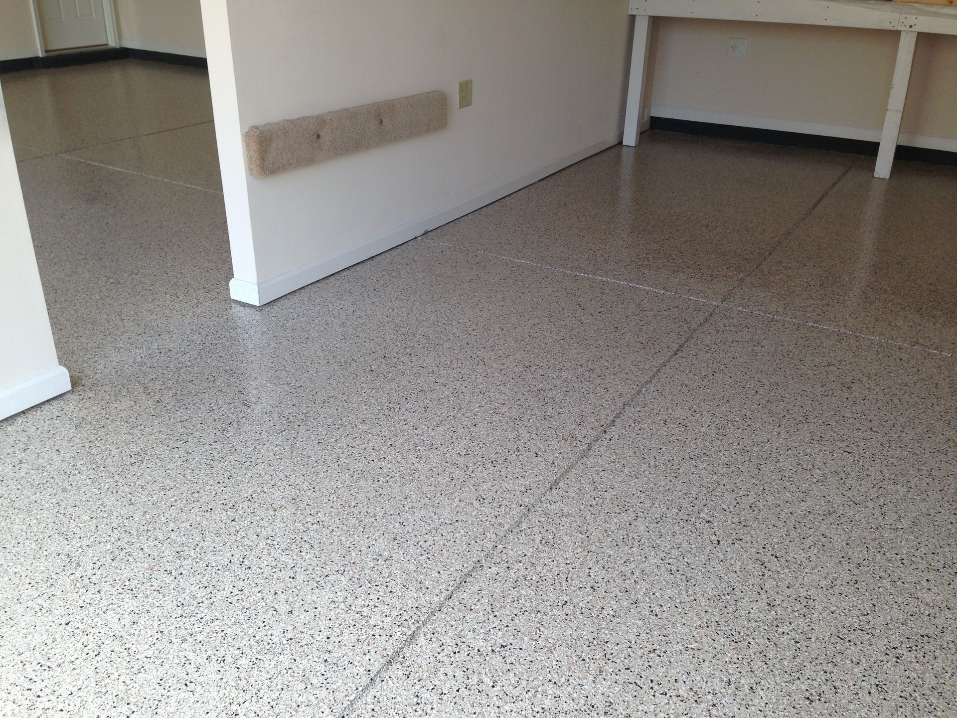 A room with a white wall and a white floor