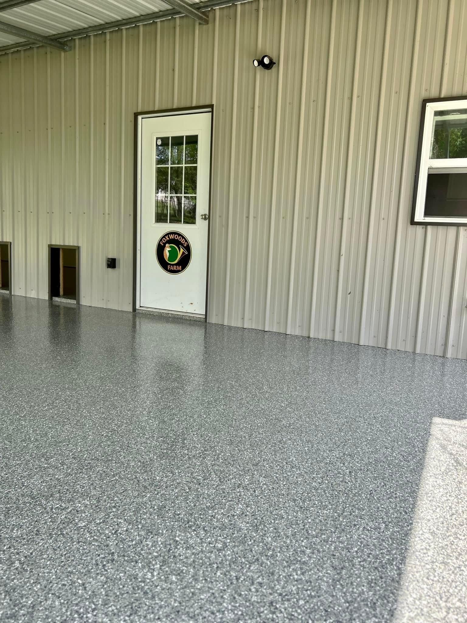 There is a door with a wreath on it in the garage.