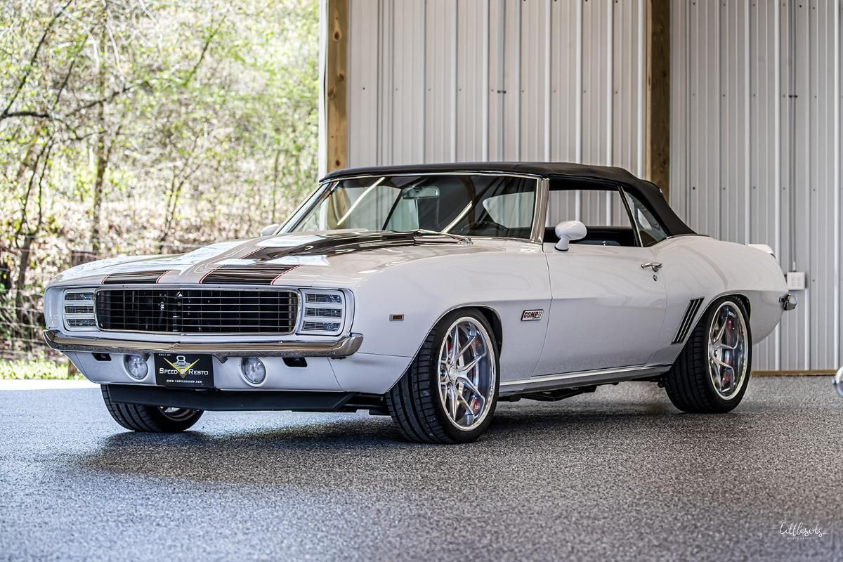 White classic car in a garage with epoxy garage floor