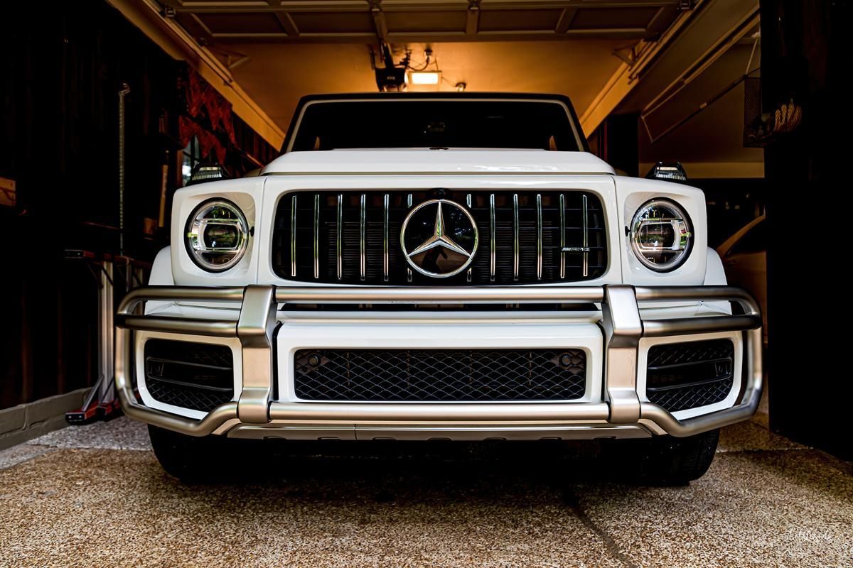 White SUV in a garage with epoxy garage floor