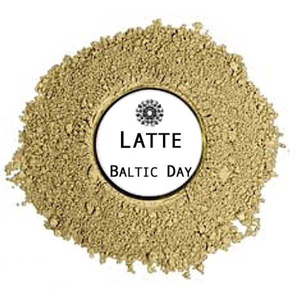A pile of coffee powder with a label that says latte baltic day.