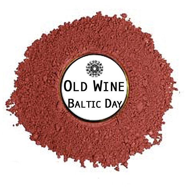 A pile of red powder with a label that says `` old wine baltic day ''.