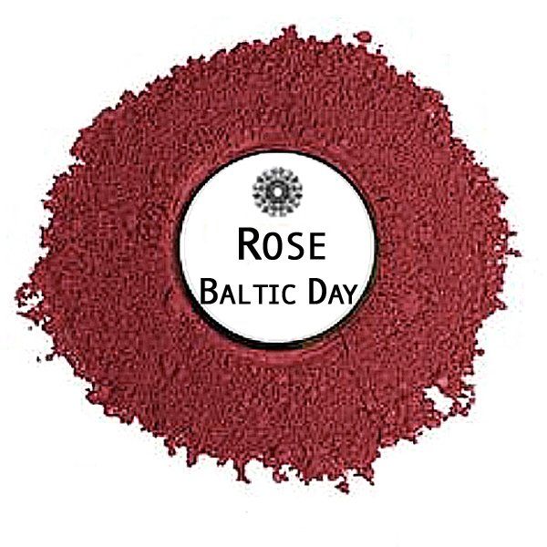 A pile of red powder with a white label that says `` rose baltic day ''.