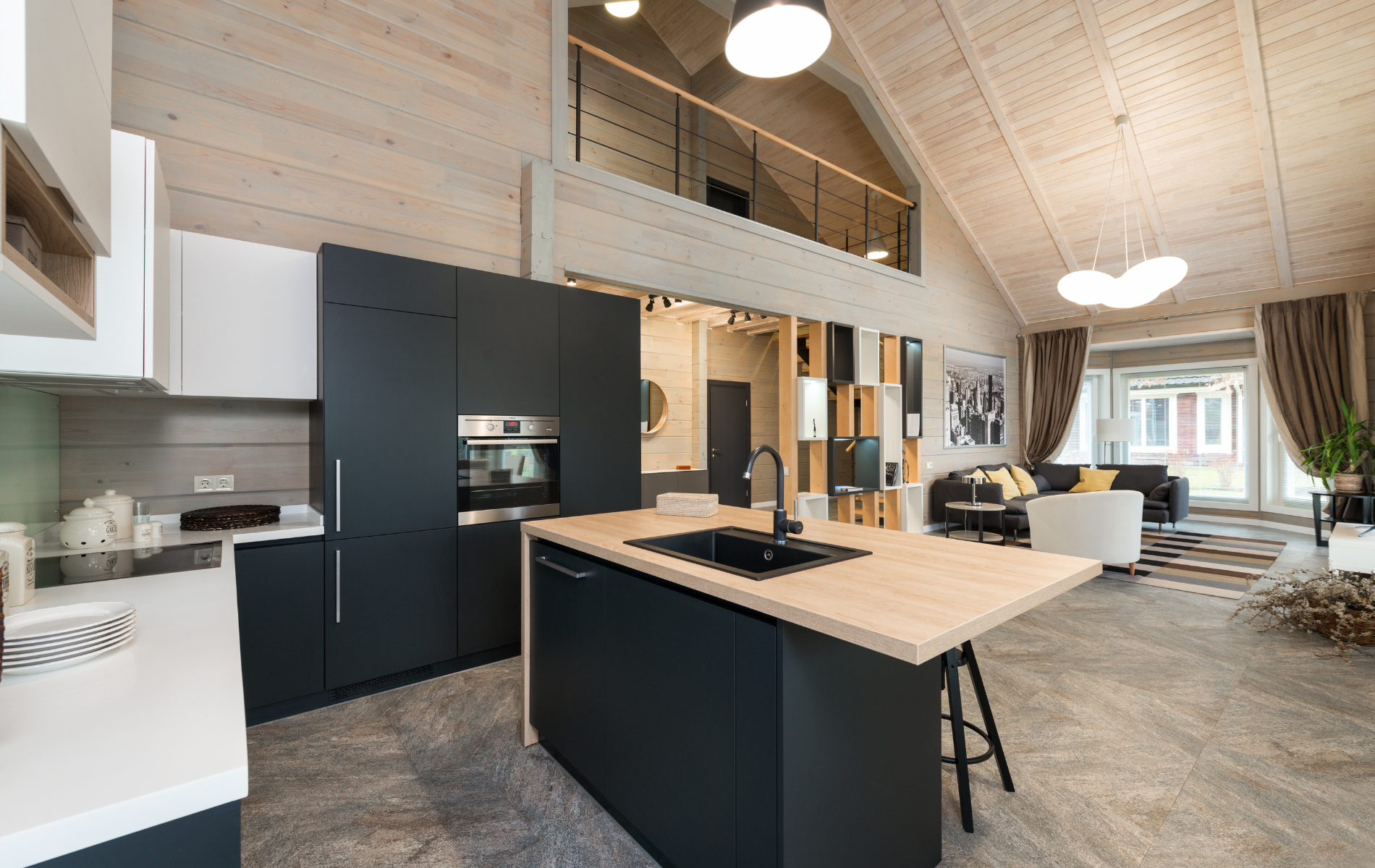 A kitchen with a large island in the middle of the room.