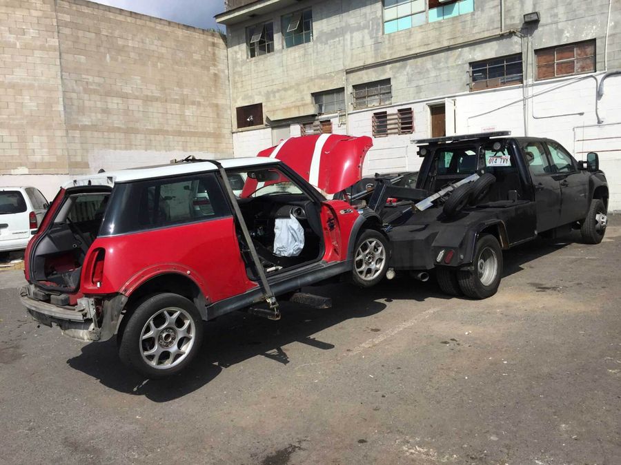 Red Tainted Car Towing — Honolulu, HI — Express Towing
