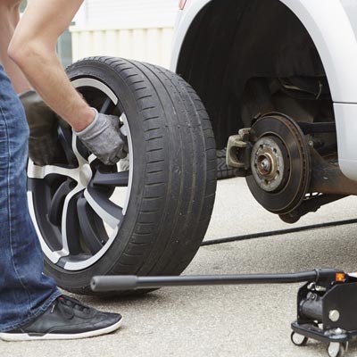 changing tire, car workshop