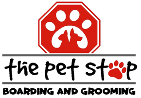 a logo for the pet stop boarding and grooming