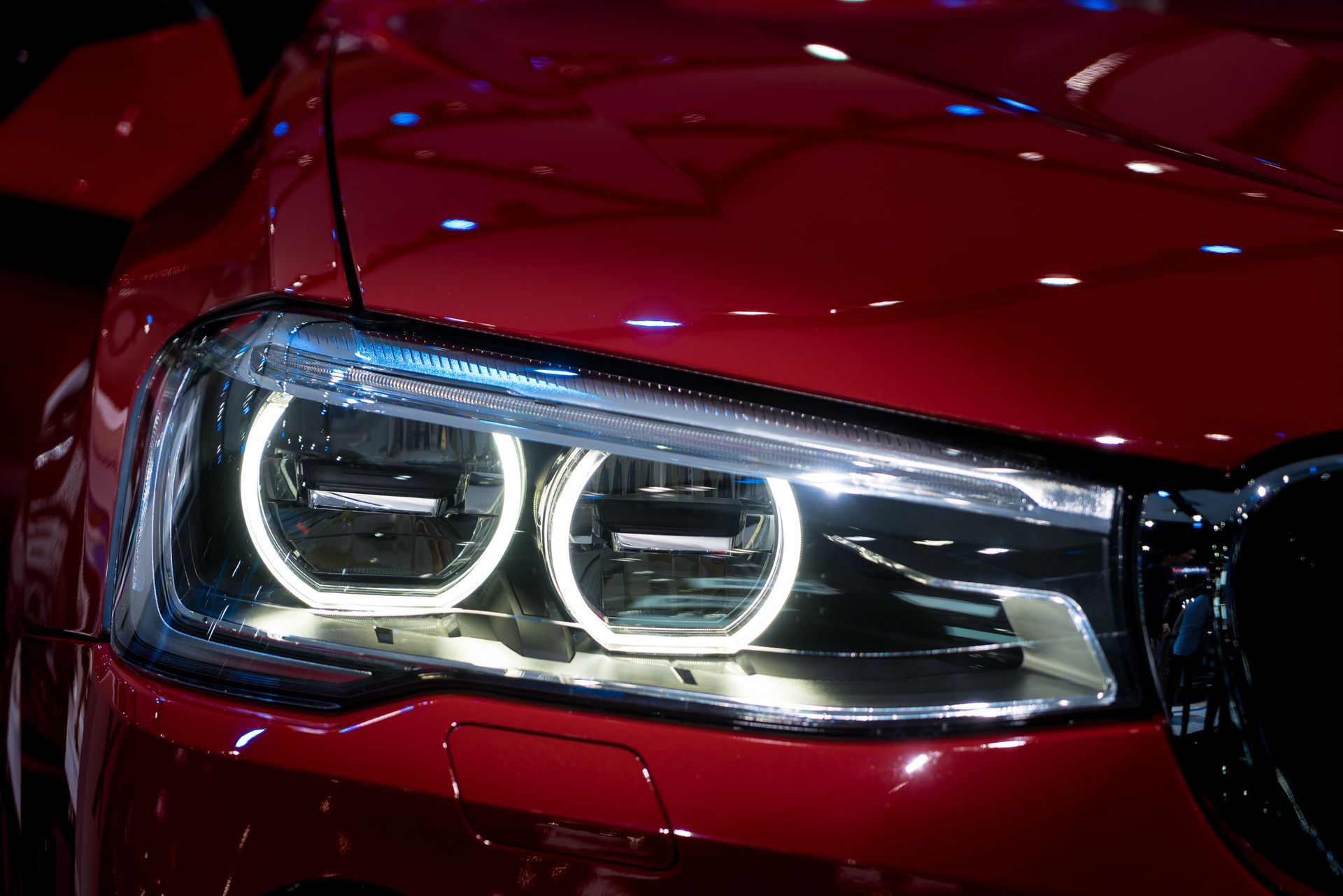 Red car headlight | Pit Shop Auto Repair - Libertyville
