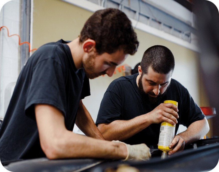 A person is standing in front of the shop | Pit Shop Auto Repair - Libertyville