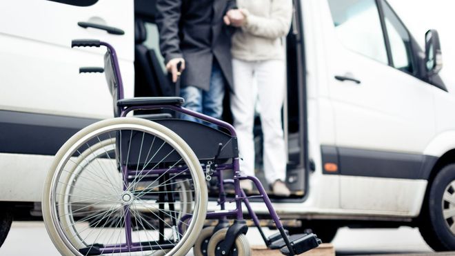 Wheelchair in front of a van