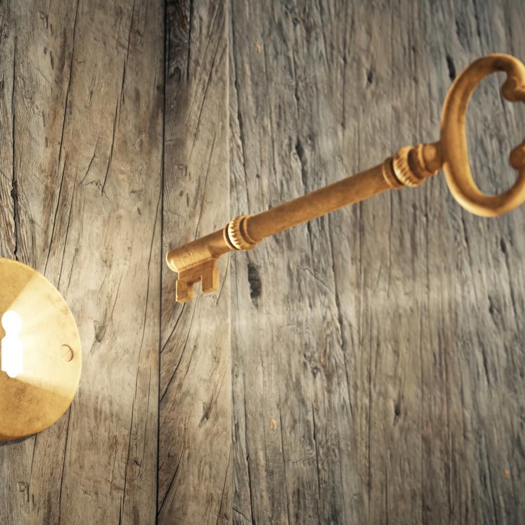 Key in lock with light shining through