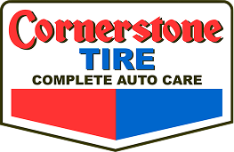 Cornerstone Tire complete auto care logo with red, blue, and black shield design