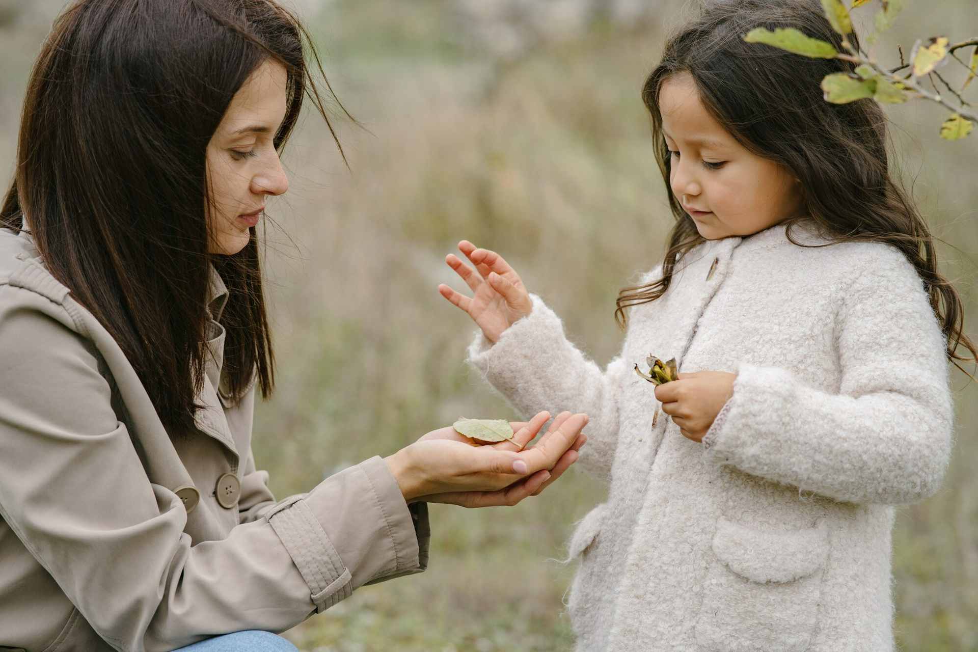 A mother plays with her daughter as a healing part of her inner child therapy.