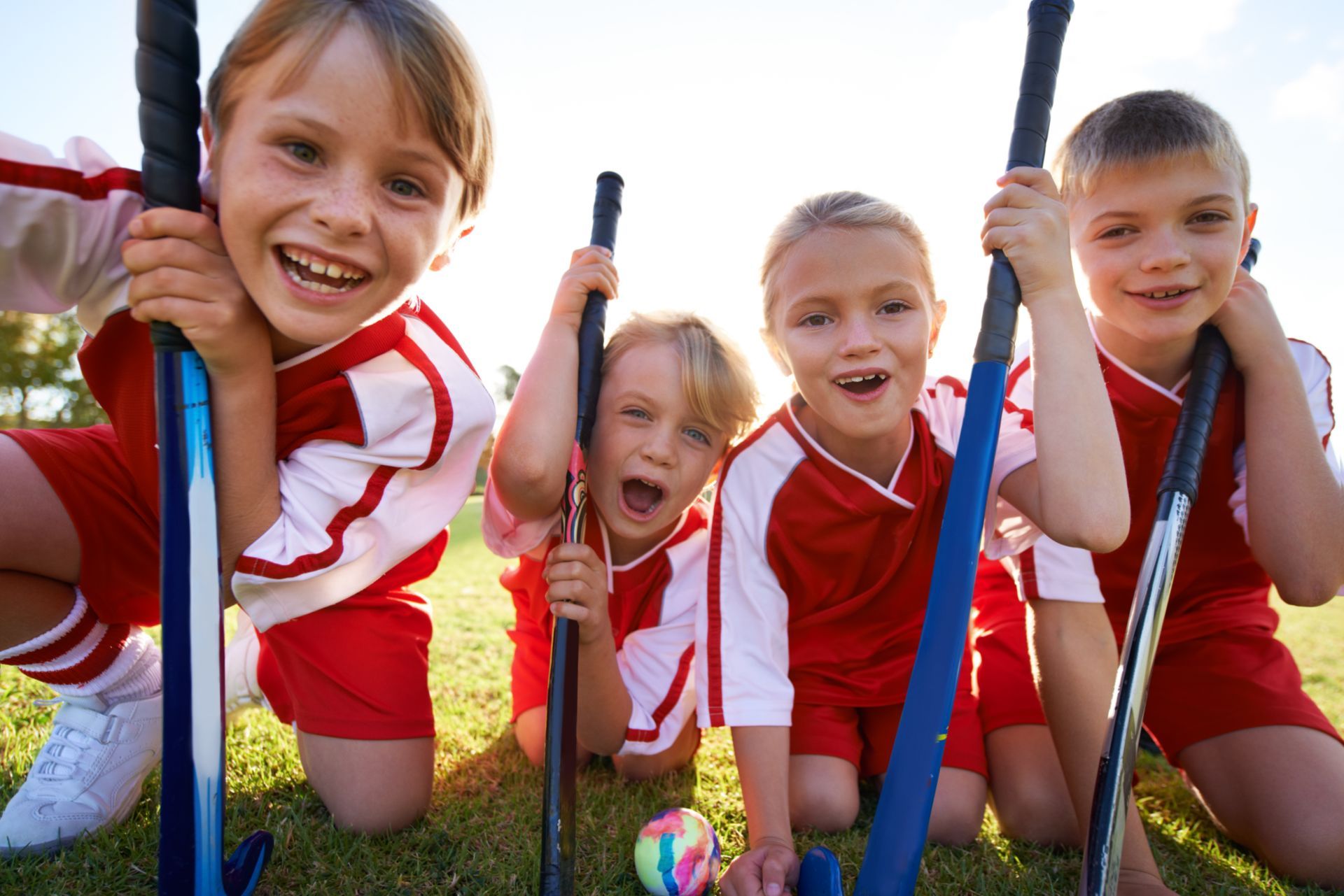 A group of children doing summer activities.