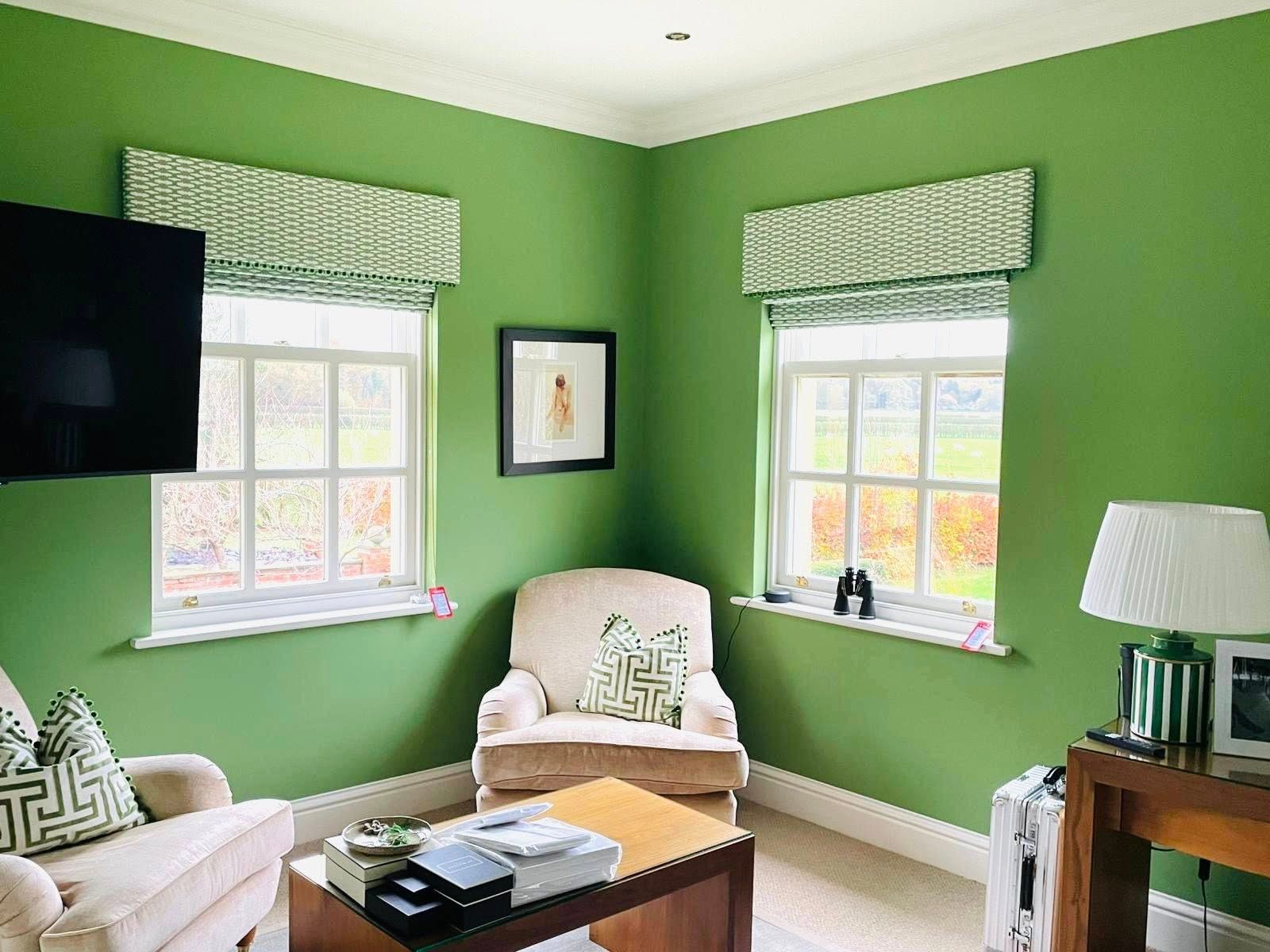 Green blinds and trimmed pelmet