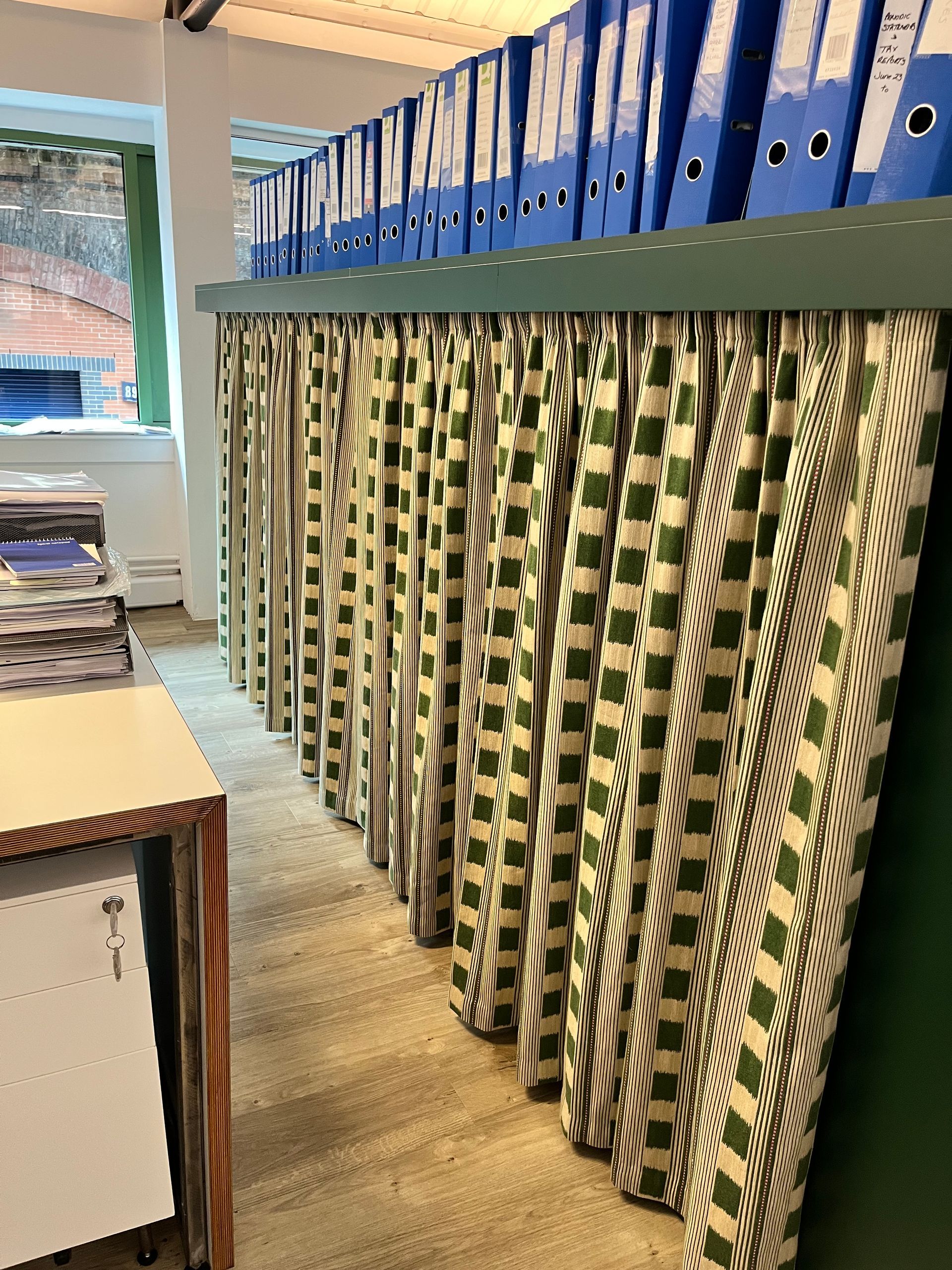 Curtains for disguising filing cabinets