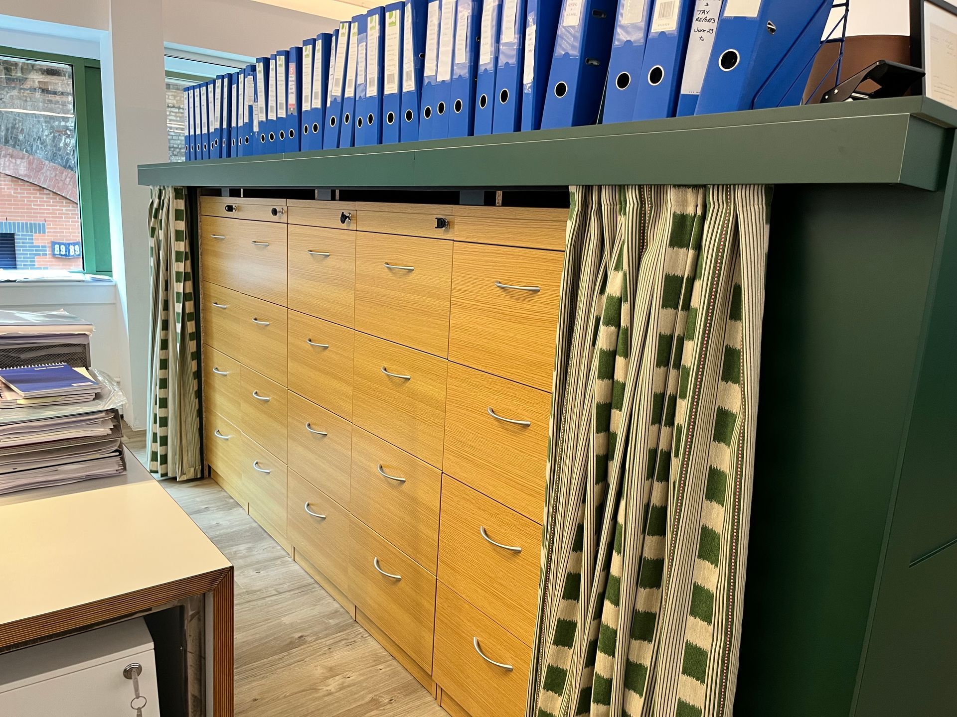 Curtains for disguising filing cabinets