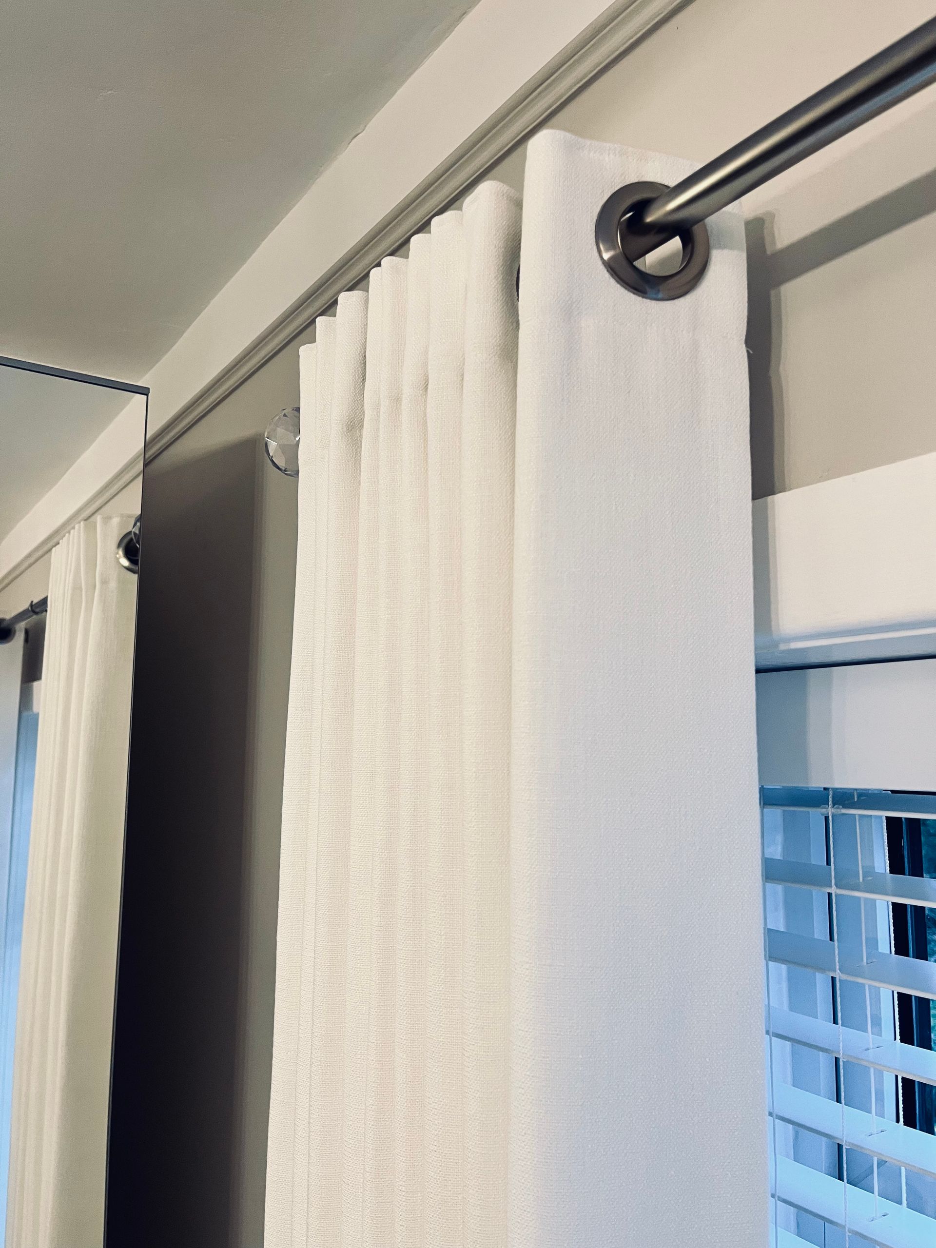 White eyelet curtain close up