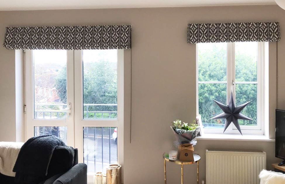 There is a star on the window sill in the living room.