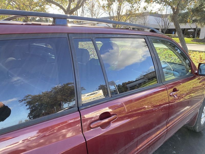 Red suv with tinted windows